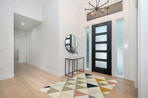 Patao Geometric Ivory/Mustard/Taupe Area Rug Wade Logan Rug Size: Rectangle 5'3" x 7' in Modern White Entryway