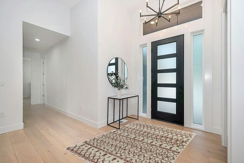 Geometric Cream/Orange Area Rug Dakota Fields Rug Size: Rectangle 5'3" x 7' in Modern White Entryway