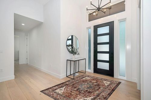 Valenrug Area Rug 5x7 - Stain Resistant Lightweight Washable Rug, Anti-Skid Rugs for Living Room, Vintage Tribal Area Rug(Coffee/Red, 5'x7') in Modern White Entryway