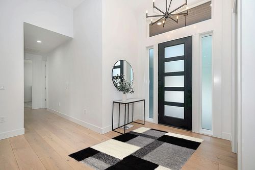 ruglots Modern Shag Geometric 5x7 (5' x 7'2'') Area Rug Cubes Black & Cream Plush Shag Blocks & Squares Plush Shag Easy Care Thick Soft Plush Living Room in Modern White Entryway