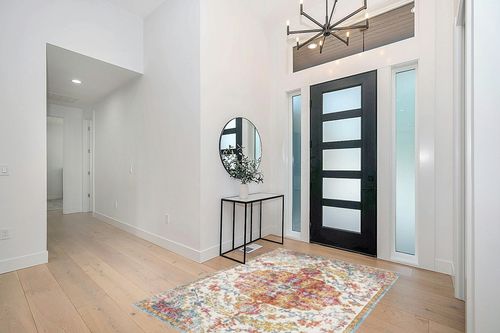 Artistic Weavers Odelia Vintage Bohemian Area Rug,5'3" x 7'3",Orange/Aqua in Modern White Entryway