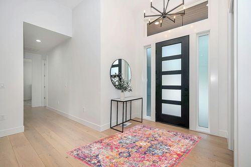 Artistic Weavers Odelia Vintage Bohemian Area Rug,5'3" x 7'3",Purple/Orange in Modern White Entryway