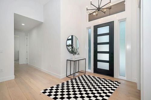 LUXE WEAVERS Checkered Black and White Geometric 5x7 Area Rug in Modern White Entryway