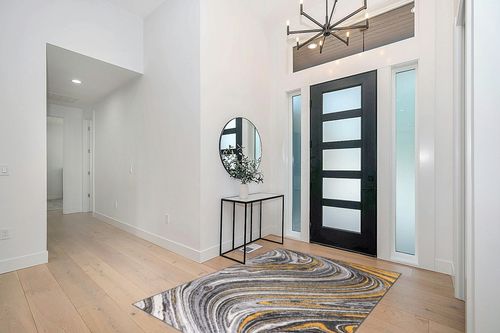 Rugshop Contemporary Abstract Swirl Stain Resistant Soft Area Rug 5' x 7' Yellow in Modern White Entryway