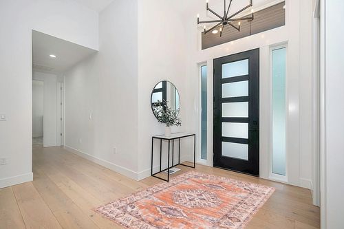 vivorug Washable Rug, Ultra Soft Area Rug 5x7, Non Slip Boho Rug Foldable, Stain Resistant Rugs for Living Room, Persian Tribal Medallion (Orange, 5'x7') in Modern White Entryway