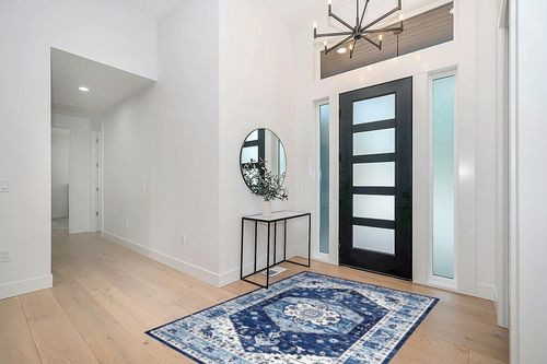 GAOMON Bohemian Washable Area Rug 5x7 Vintage Living Room Rug, Large Non-Slip Boho Bedroom Throw Mat,Blue Floral Printed Non-Shedding Carpet for Dining Room Dorm,Blue in Modern White Entryway