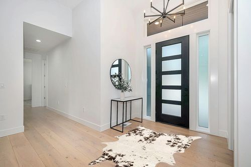 nuLOOM Marcia Machine Washable Faux Cowhide Area Rug, 5' x 6' 7", Brown in Modern White Entryway