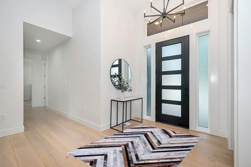 DECOMALL Coronado Washable Rugs 5x7, Modern Geometric Rug with Rubber Backing, Faux Cowhide Area Rug Non Slip Carpet for Living Room Bedroom Dinning Room, 5x7ft, Multi in Modern White Entryway