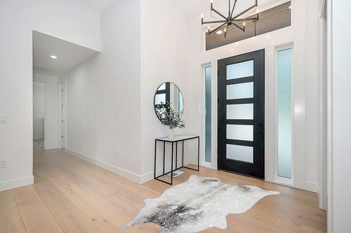 Loloi II Odessa Collection ODE-02 Silver/Grey 5' x 6'-6" Area Rug in Modern White Entryway