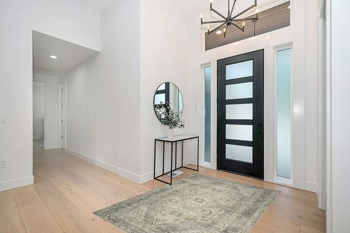 Magnolia Home by Joanna Gaines x Loloi Sinclair Collection SIN-04 Natural / Sage 5'-0" x 7'-0" Area Rug in Modern White Entryway