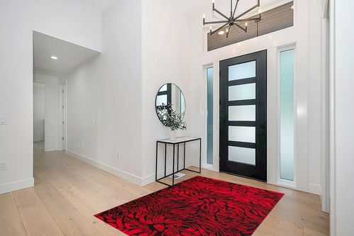 Antep Rugs Floral 5x7 Abstract Indoor Area Rug Siesta (Red Black, 5'3" x 7') in Modern White Entryway