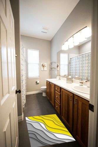 Yellow Gradient Area Rugs in Wooden and Grey Bathroom