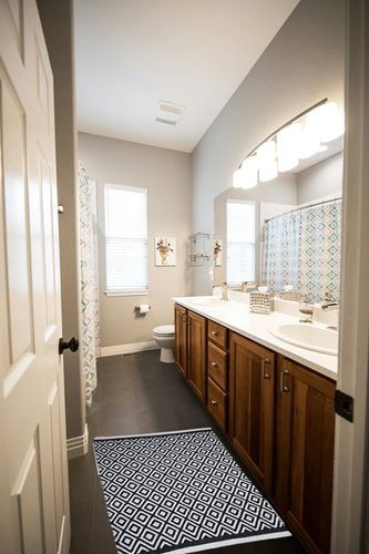 Small Black White Cotton Rag Rug in Wooden and Grey Bathroom