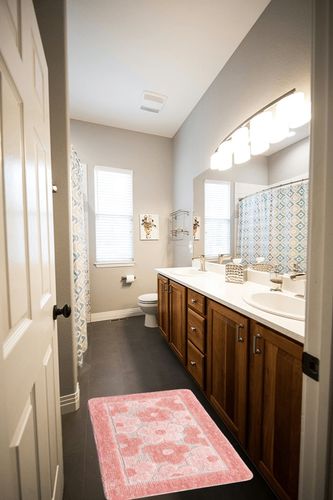 WREWING Flower Rug Bath Mat, Cute Soft Thickened Microfiber Cherry Blossom Floor Mat, Water Absorbent Non Slip Bathroom Rug for Entrance Bedroom Kitchen Bathroom Toilet 20 x 31 Inches (Pink) in Wooden and Grey Bathroom