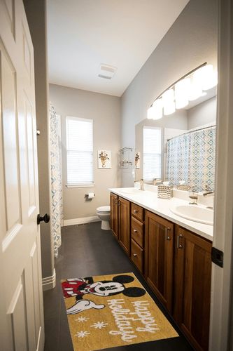 Gertmenian Mickey Mouse Holiday Rug, Coir Front Door Mat (2-Pack), Outdoor Mats for Home Entrance, Retro Welcome Mat, Disney Home Decor, 20" x 34" Each, Red Home Merry Christmas Gift Set, 46646 in Wooden and Grey Bathroom