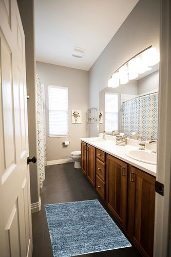 nuLOOM Brooke Shag Tasseled Accent Rug, 2x3, Blue in Wooden and Grey Bathroom