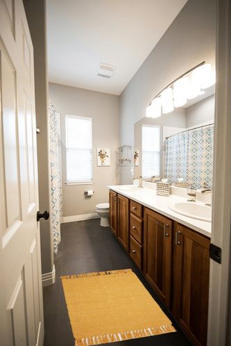 DII Woven Rugs Collection Ribbed Reversible Cotton, 2x3', Honey Gold & Off-White in Wooden and Grey Bathroom