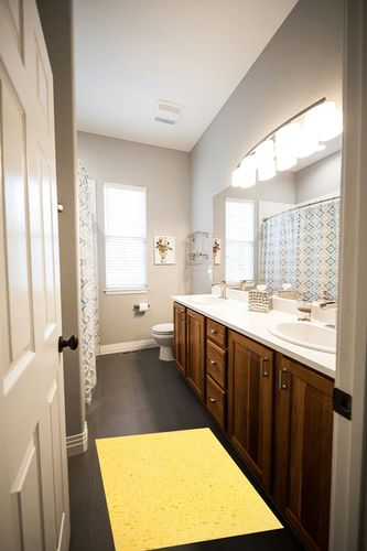 Garland Rug Traditional Plush 3 Piece Nylon Washable Bathroom Rug Set Rubber Ducky Yellow in Wooden and Grey Bathroom