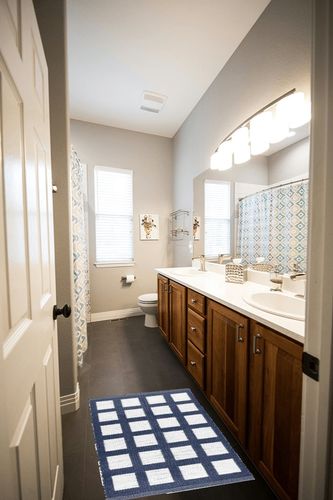 Dash and Albert Paver Navy Handwoven Indoor/Outdoor Rug, 2 X 3 Feet, White/Blue Geometric Pattern in Wooden and Grey Bathroom