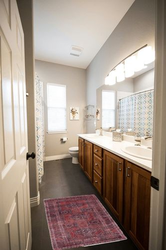 Adiva Rugs Machine Washable Area Rug with Non Slip Backing for Living Room, Bedroom, Bathroom, Kitchen, Printed Vintage Home Decor, Floor Decoration Carpet Mat (RED/Brown, 2' x 3') in Wooden and Grey Bathroom