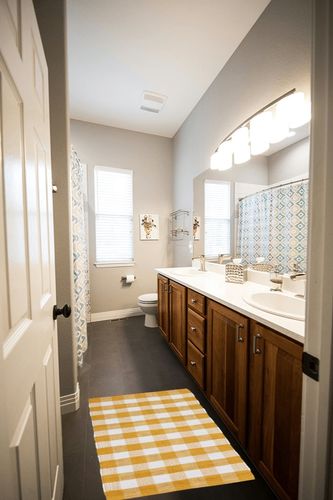 DII Buffalo Check Rug Collection, Hand Dyed Reversible Chindi Rug, 26x40, Honey Gold in Wooden and Grey Bathroom