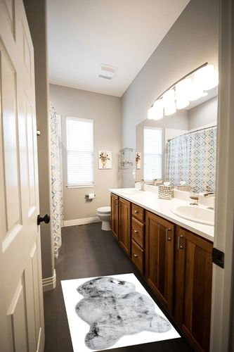 Mon Chateau Luxury Collection Luxe Faux Fur Rug 60cm x 99cm (24in x 39in), Silver Grey in Wooden and Grey Bathroom