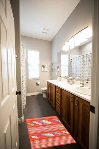 Dash and Albert Chester Kilim Handwoven Wool Rug, 2 X 3 Feet, Yellow/Orange/Blue Stripe Pattern in Wooden and Grey Bathroom