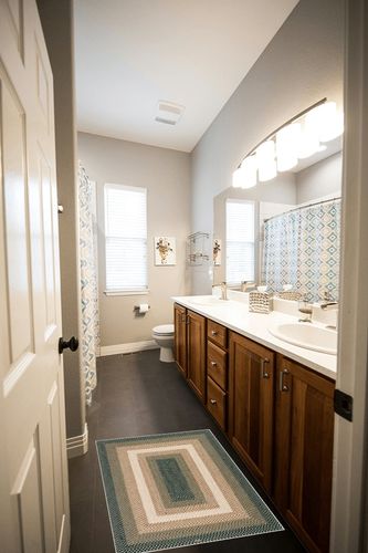 Better Trends Woodbridge Braid Collection is Durable, Mildew and Moisture Resistant Reversible Indoor Area Utility Rug 100% Wool in Vibrant Colors, 20" x 30" Rectangle, Green in Wooden and Grey Bathroom