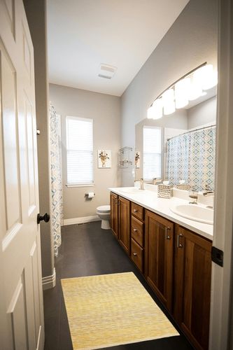 DII Woven Rag Rug Collection Recycled Yarn Variegated Rustic Stripe, 2x3', Honey Gold in Wooden and Grey Bathroom