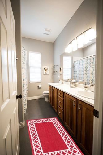 Nautica Runner Rug | Indoor Carpet for Entryway & Hallway Rug| Non-Slip and Non-Skid Entry and Kitchen Door Mat| Machine Washable Low Profile Floor Mat | 26" x 45"| Trellis Border Red and White in Wooden and Grey Bathroom