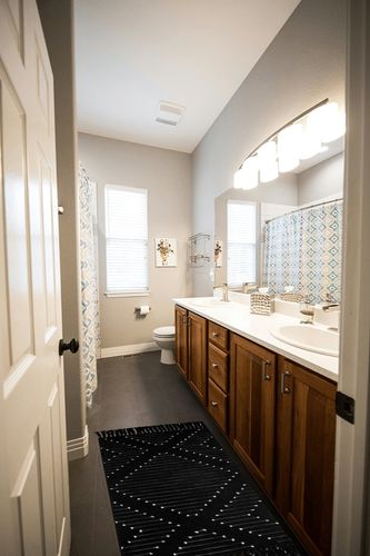MitoVilla Boho Kitchen Runner Rug 2'x4.3', Black and White Hallway Rugs, Farmhouse Simple Geometric Bath Mat with Tassel, Washable Cotton Woven Living Room Rug in Wooden and Grey Bathroom