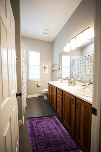 Modefa Velvet Prayer Rug - Soft Plush Turkish Janamaz Sajada Carpet for Men and Women - Plain Solid Prayer Mat Ramadan Eid Gift - with Prayer Beads - Luxury Floral Stamp (Purple) in Wooden and Grey Bathroom