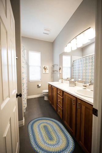 Homespice Sunflower French Country Rugs for Kitchen 27x45 Blue Yellow Oval Braided Rugs in Wooden and Grey Bathroom