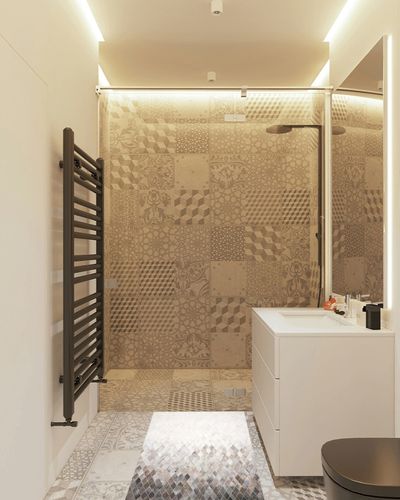 Loloi II Maddox Collection MAD-04 Sand/Taupe 2'-3" x 3'-9" Accent Rug in White Tiled Bathroom
