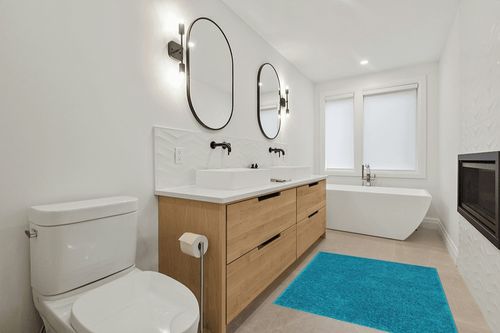 Well Woven Elle Basics | Emerson Shag Teal Blue | Textured Area Rug (3'11" x 5'3") in Scandinavian Neutral bathroom