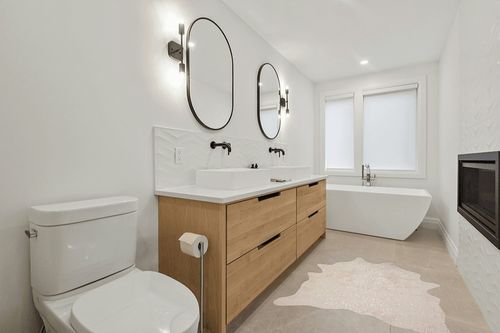 Loloi II Bryce Collection BZ-08 Ivory/Champagne 3'-10" x 5' Accent Rug in Scandinavian Neutral bathroom