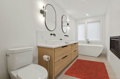 Unique Loom Solid Shag Collection Area Rug (4' 1" x 6' 1" Rectangle, Terracotta) in Scandinavian Neutral bathroom