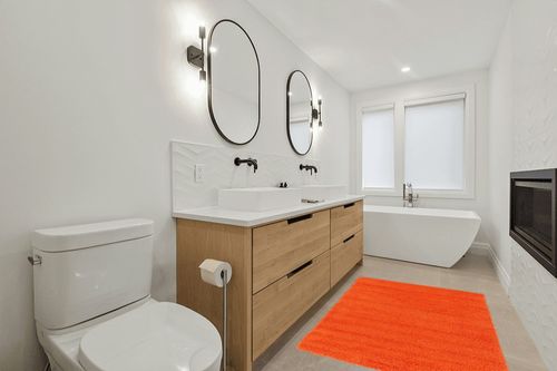 Unique Loom Solid Shag Collection Area Rug (4' 1" x 6' 1" Rectangle, Tiger Orange) in Scandinavian Neutral bathroom