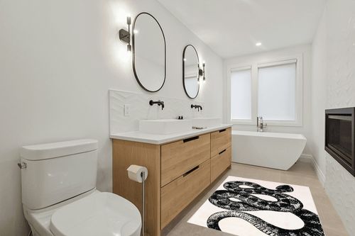 nuLOOM Modern Slithering Serpent Machine Washable Area Rug, 4x6, Black in Scandinavian Neutral bathroom