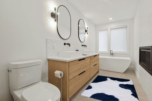 Safavieh Faux Hide Collection Accent Rug - 4' x 6', Ivory & Dark Blue, Non-Shedding & Easy Care, Machine Washable Ideal for High Traffic Areas in Entryway, Living Room, Bedroom (FAH548A) in Scandinavian Neutral bathroom