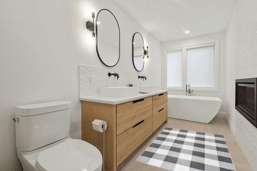nuLOOM Lucy Machine Washable Farmhouse Buffalo Plaid Area Rug, 4x6, Grey in Scandinavian Neutral bathroom