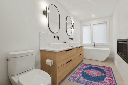 HomeRoots 4' X 6' Blue Power Loom Area Rug in Scandinavian Neutral bathroom