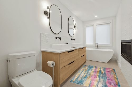 HomeRoots 4' X 6' Pink and Blue Abstract Power Loom Area Rug in Scandinavian Neutral bathroom