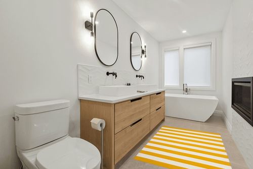 SAFAVIEH Montauk Collection Accent Rug - 4' x 6', Yellow & Ivory, Handmade Flat Weave Boho Farmhouse Cotton Stripe, Ideal for High Traffic Areas in Entryway, Living Room, Bedroom (MTK712A) in Scandinavian Neutral bathroom