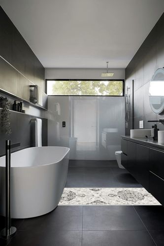 Odelia Vintage Bohemian Area Rug in Black Modern Bathroom