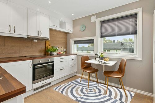 nuLOOM Modern Swirls Machine Washable Area Rug 4' x 6' in Blue in Wood and White Small Kitchen