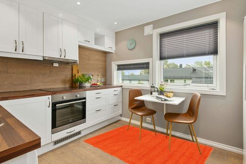 Unique Loom Solid Shag Collection Area Rug (4' 1" x 6' 1" Rectangle, Tiger Orange) in Wood and White Small Kitchen