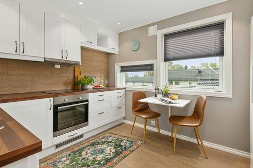 Wonnitar Bohemian Medallion Area Rug in Wood and White Small Kitchen