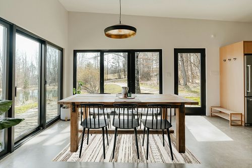 Washable Large Soft Neutral Boho Moroccan Bohemian Farmhouse Rug in Scandinavian Dining Room with Rectangular Table