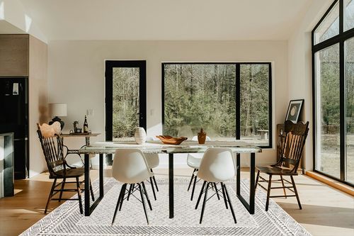 Artistic Weavers Melodie Boho Farmhouse Area Rug,6'7" x 9',Beige in Modern Scandinavian Dining Room with Black Accents